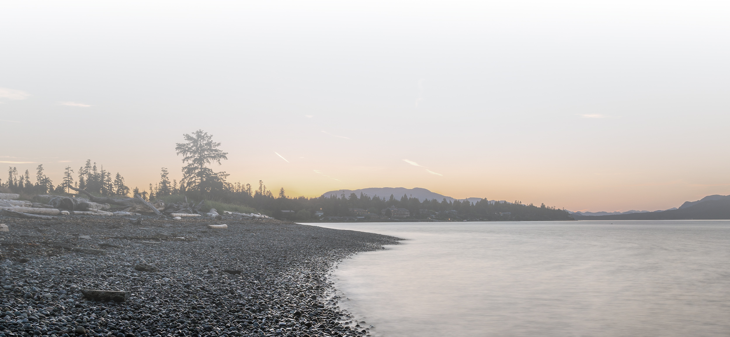 Empty Rocky Beach at Dusk. Campbell River, BC, Canada.